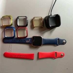 Fitbit Versa with screen covers and bands